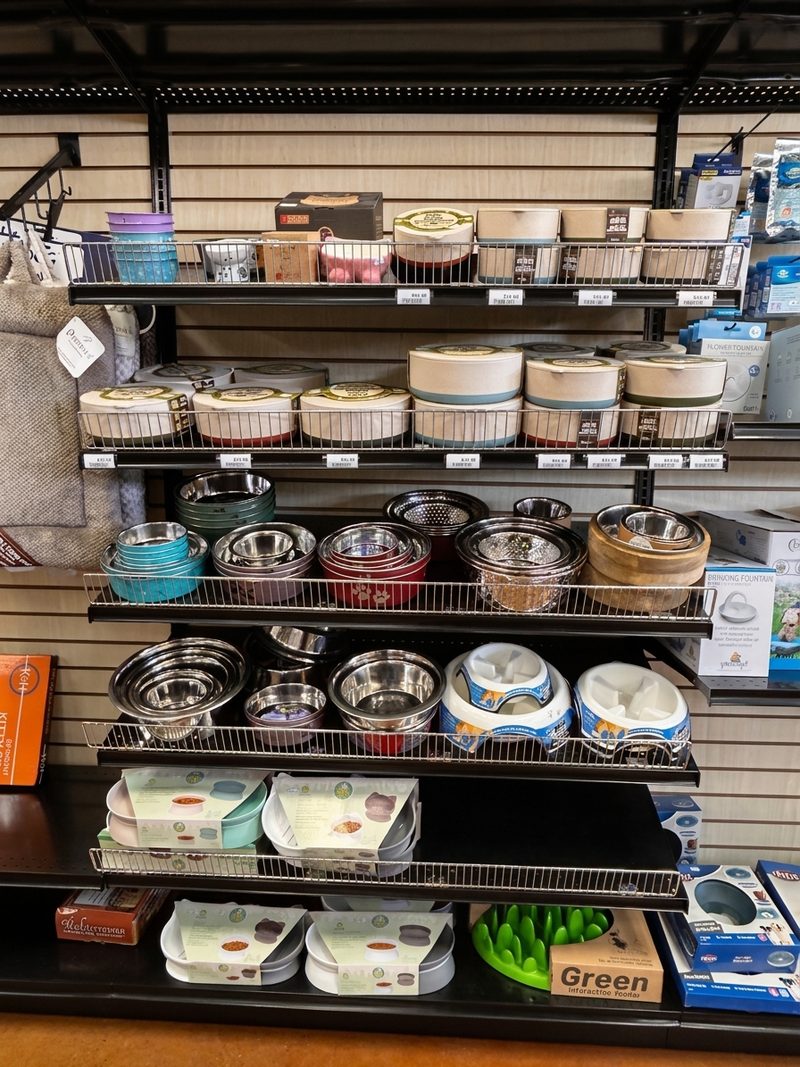 Shelves of stainless, ceramic and slow-feeder bowls