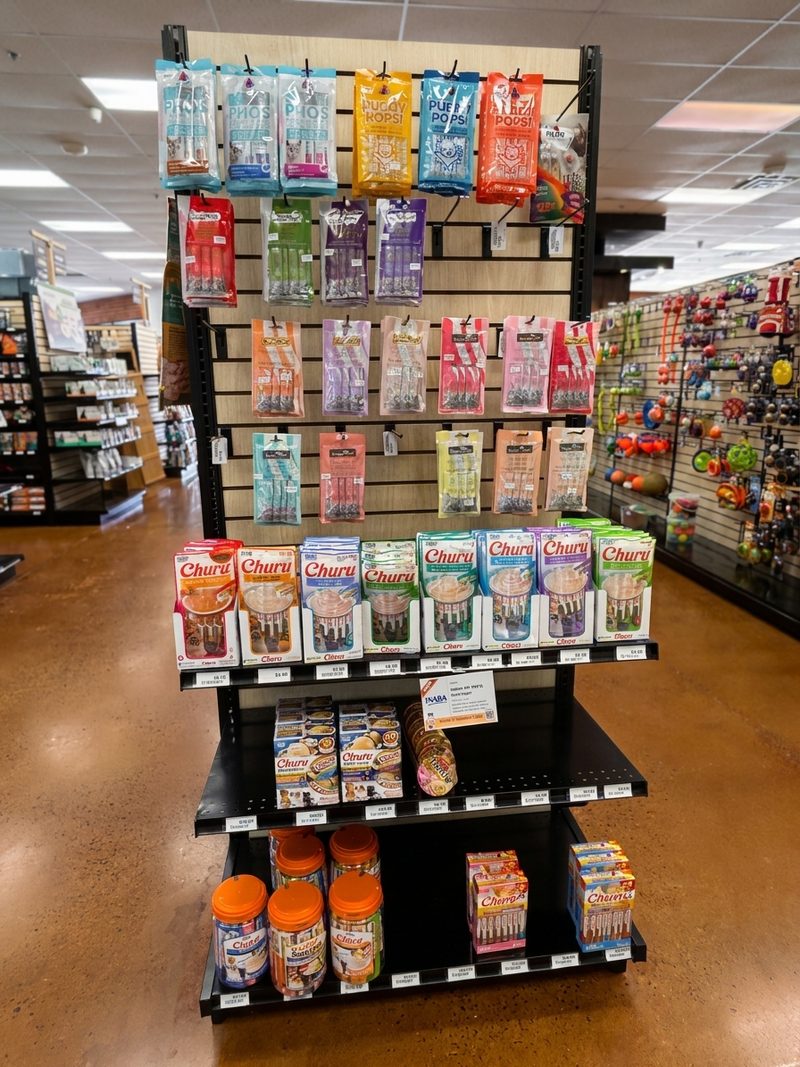 An endcap of Churu and other lickable cat treats